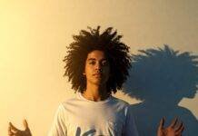 Overcoming the Fear of Being Truly Seen: Embracing Your Authentic Self Emerging from shadows into light