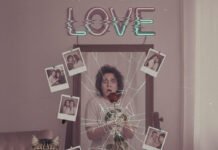 How to Date with Confidence When You Feel Insecure Cracked mirror, panicked reflection, cat, neon sign.