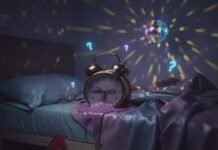 Sex Myths That Are Quietly Ruining Your Love Life A surreal bedroom scene with a melting clock, phone, and stiletto.