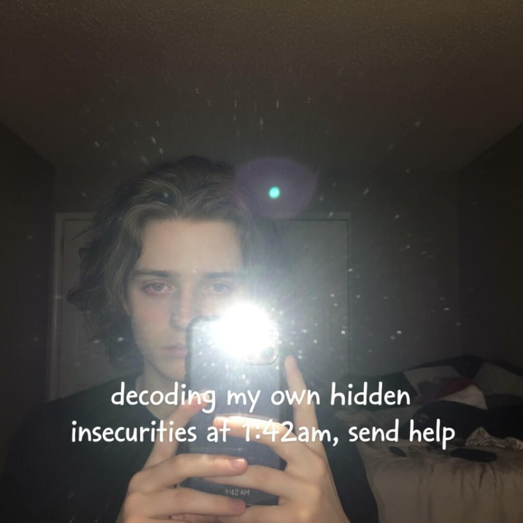 Mirror selfie, flash on, bloodshot eyes, caption about insecurities.