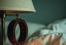 Exploring Kinks Safely: A Beginner’s Guide for Couples Leather cuff dangles, foot peeks, candle glows
